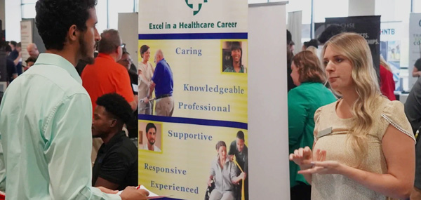 health career expo with people talking